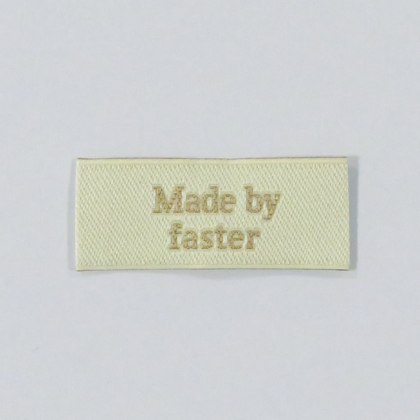 Mærkat - "Made by faster"